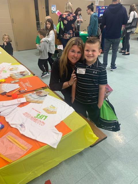 Nicholas Gladkowski and his mother Tammy learn about the services at Sunrise Estates Elementary