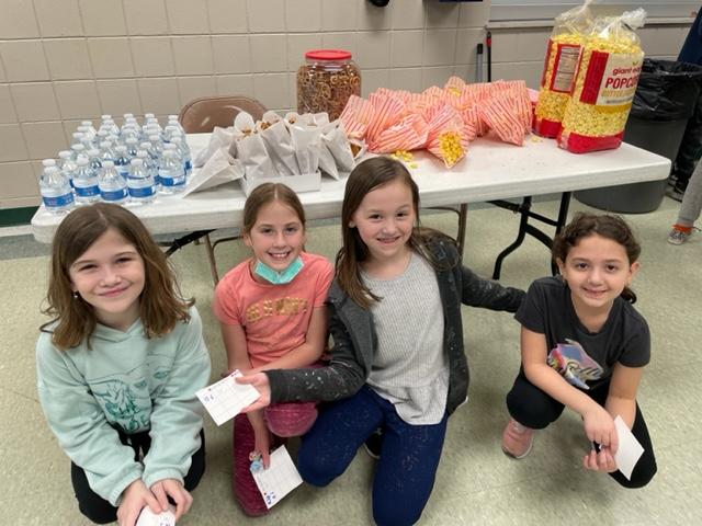 Third-graders Eowyn Creps, Kiley Burnett, Emily Ross, and Aria O’Donnell take a break for some