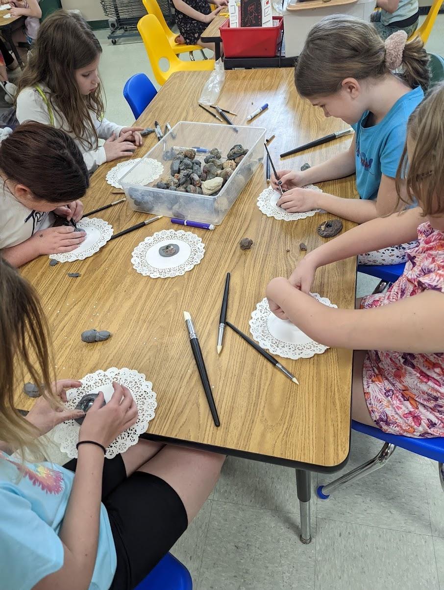 3rd-graders work on their art pieces