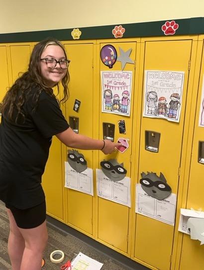 5th-grader Minka Clawson decorates a locker