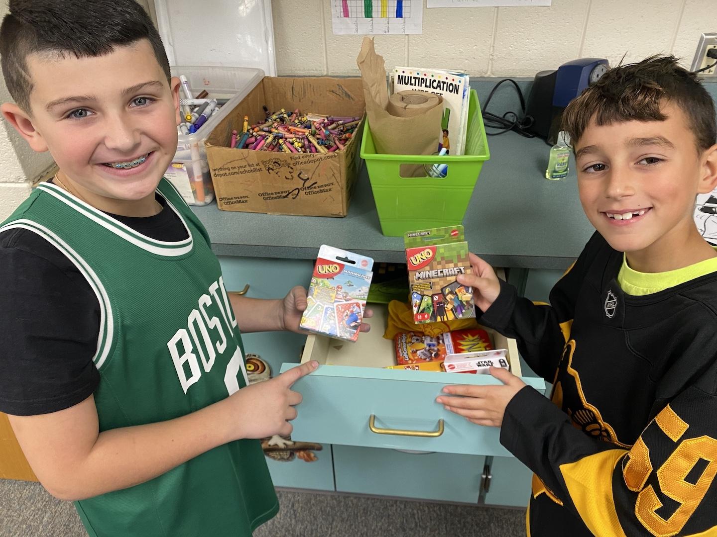 Vito Shinton and Leo Pasquarelli select games for their indoor recess
