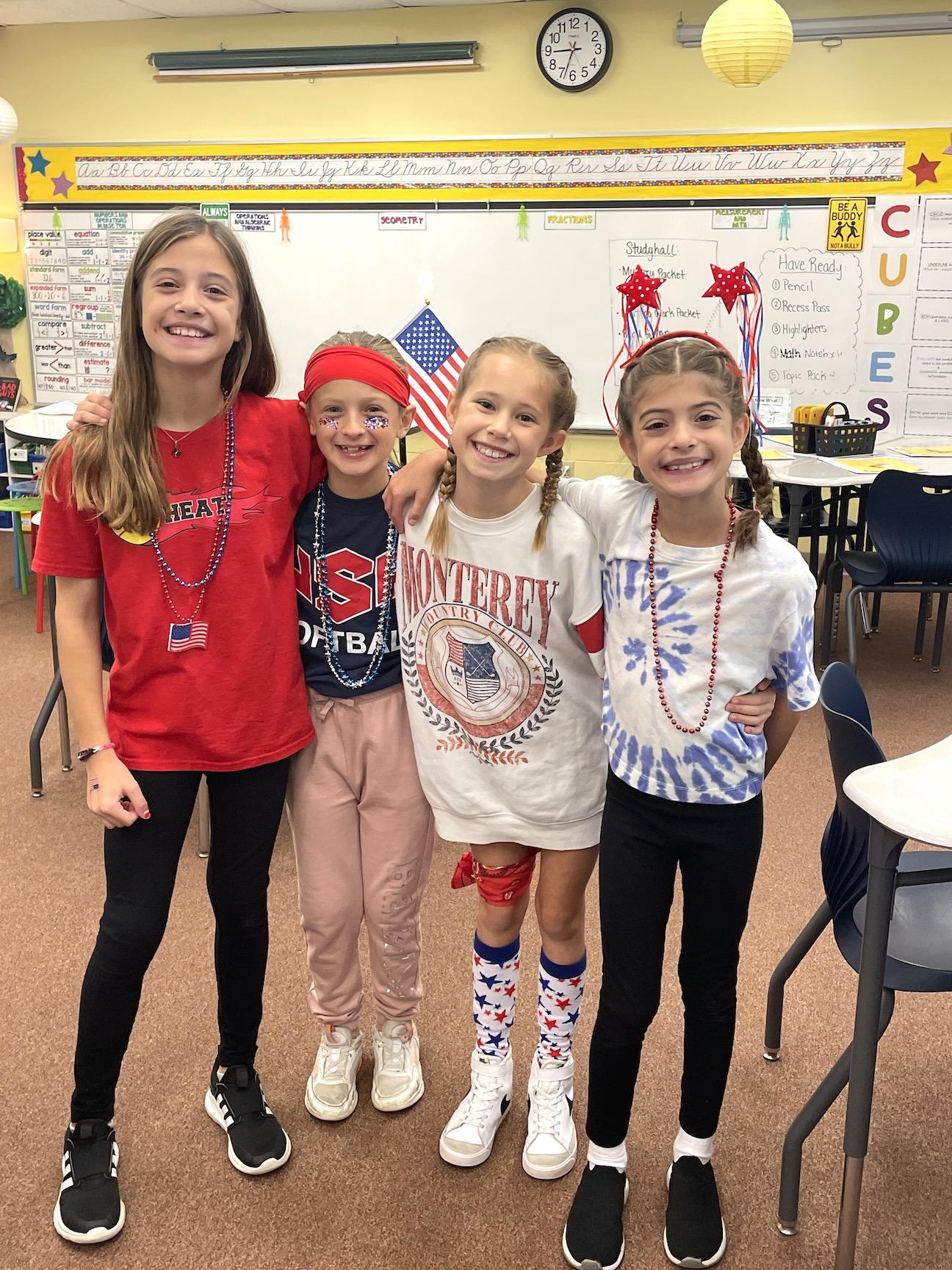 Harrison Park Elementary students Kendall Scavincky, Nina Padezan, Capriana Caruso, and Willow Scavincky ‘cast their vote to be Drug-Free’ by dressing in red, white, and blue on Tuesday